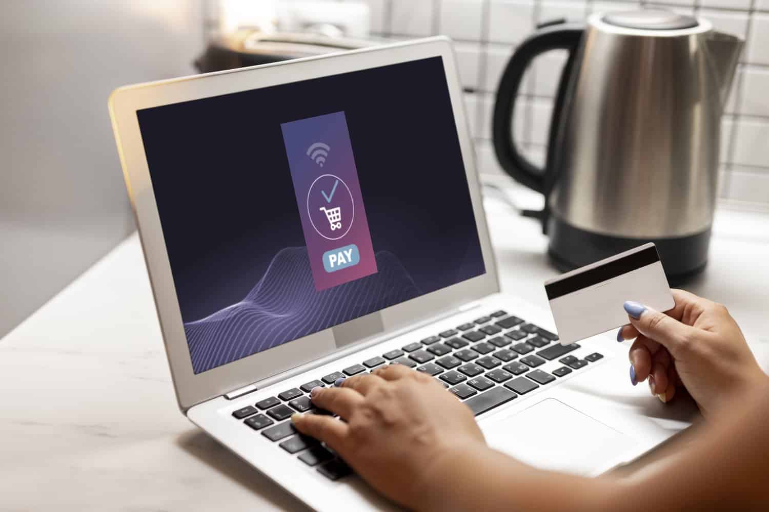 Customer using credit card for online purchase with a reliable uptime system in place
