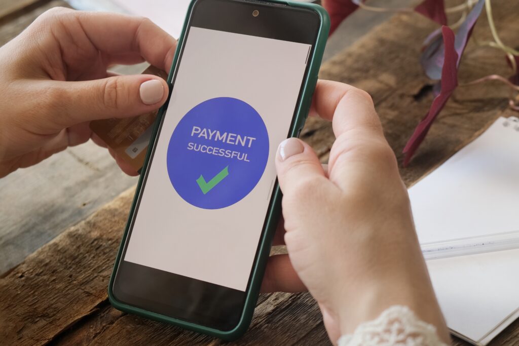 Customer completes payment via payment link with successful confirmation on screen